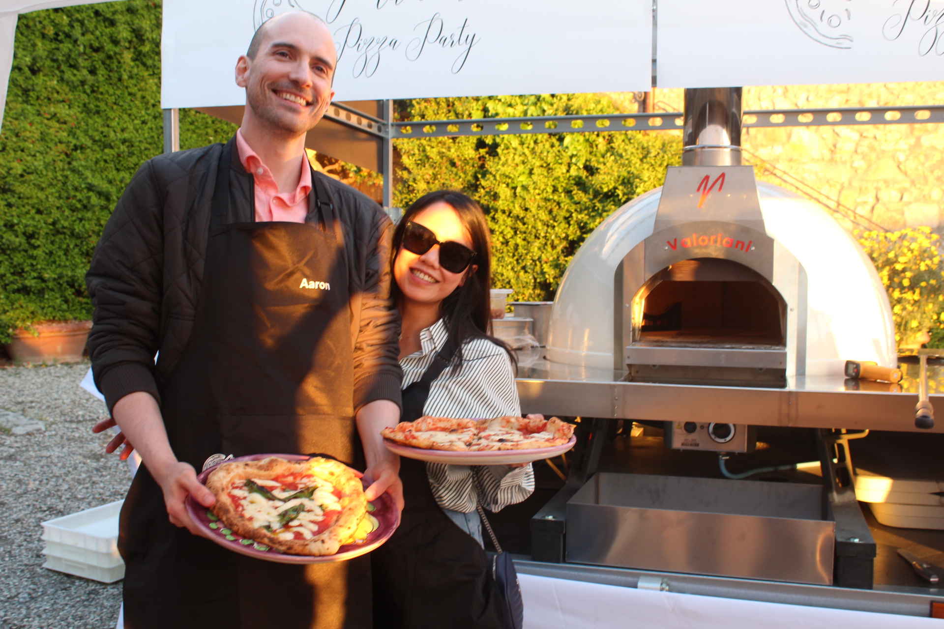 Pizza being served late in the evening at a Tuscan wedding