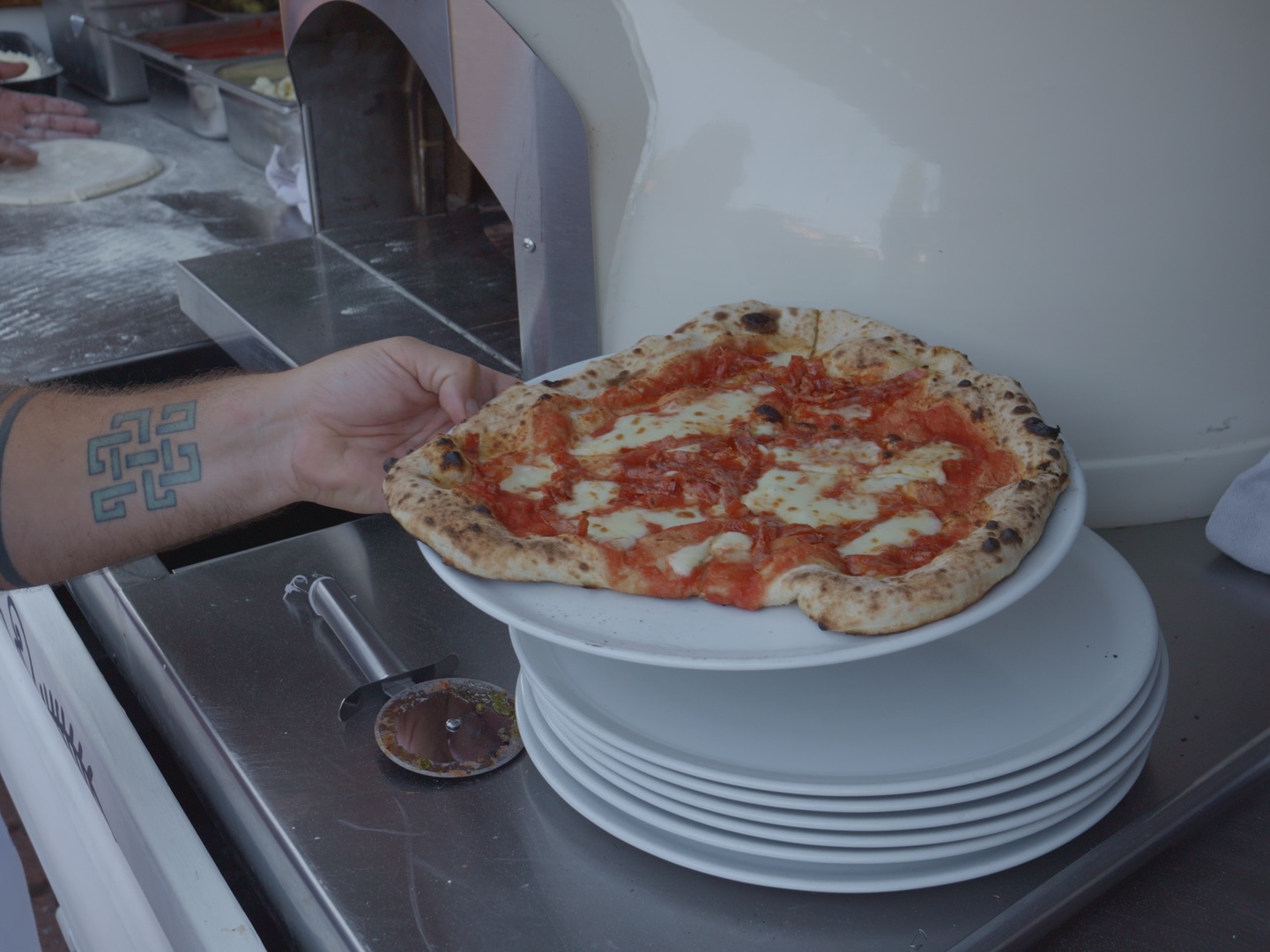 Wedding celebration with pizza at a farmhouse in the Val d'Orcia countryside